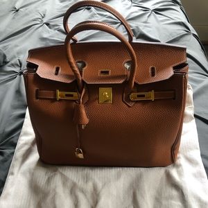 British Tan Satchel with lock and key